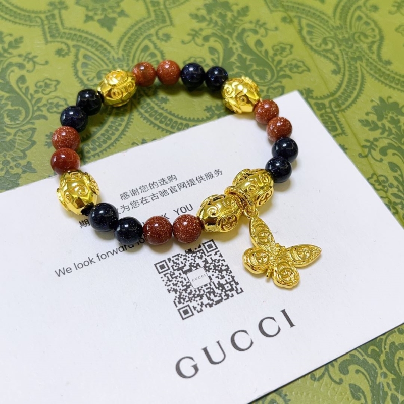G*u*i bracelets